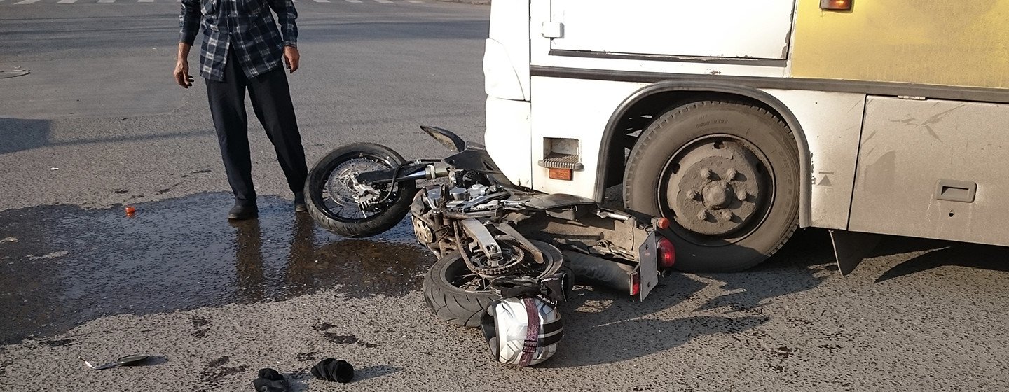 Motorcycle crushed on its side after an accident